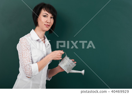 girl teacher posing chalk Board learning concept girl teacher posing chalk Board learning concept 40469929