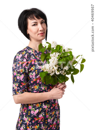 woman in dress with flower pattern on white 40469987