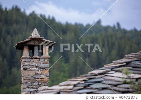 Traditional Rhodopean stone built chimney Traditional Rhodopean stone built chimney 40472878