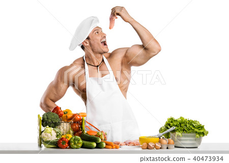 Man bodybuilder in white toque blanche Man bodybuilder in white toque blanche 40473934