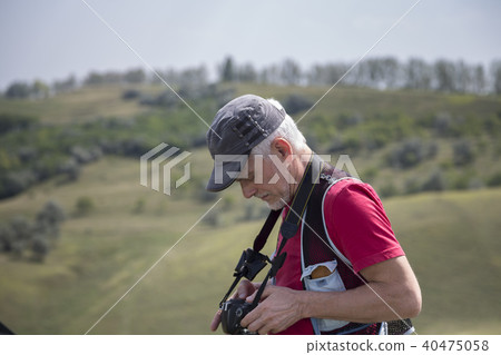 Nature photographer with digital camera. Nature photographer with digital camera. 40475058