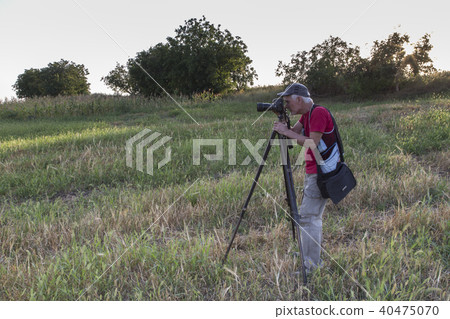 Nature photographer with digital camera. Nature photographer with digital camera. 40475070