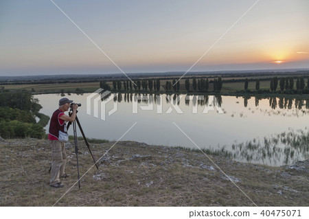 Nature photographer with digital camera. Nature photographer with digital camera. 40475071