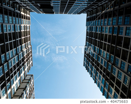 building in the city on blue sky background building in the city on blue sky background 40475683
