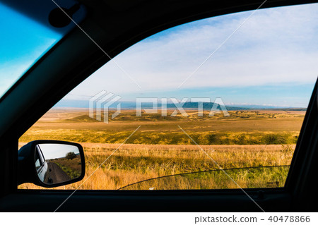 Unusual angle from the car window Panorama of a beautiful landscape with mountain ranges in 40478866