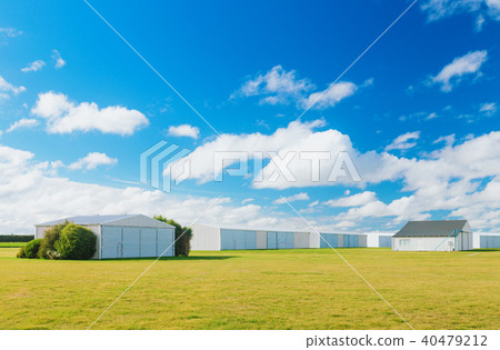 Metallic warehouse with blue sky 40479212