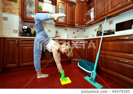 Gymnastics during washing floors. Gymnastics during washing floors. 40479395
