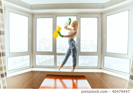 Cleaning lady is dancing. Cleaning lady is dancing. 40479447