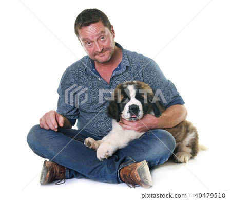 puppy saint bernard and man 40479510