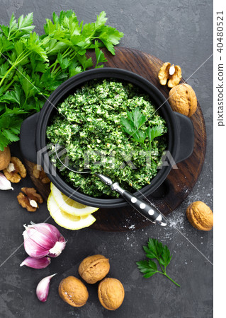 Pesto. Italian pesto with fresh pasrley Pesto. Italian pesto with fresh pasrley 40480521