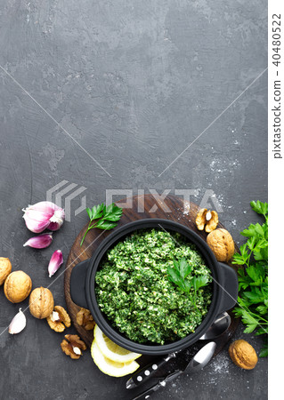 Pesto. Italian pesto with fresh pasrley Pesto. Italian pesto with fresh pasrley 40480522