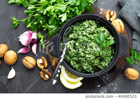 Pesto. Italian pesto with fresh pasrley Pesto. Italian pesto with fresh pasrley 40480523