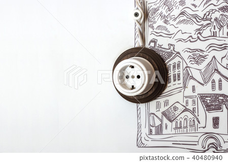 Socket on the wall. 40480940