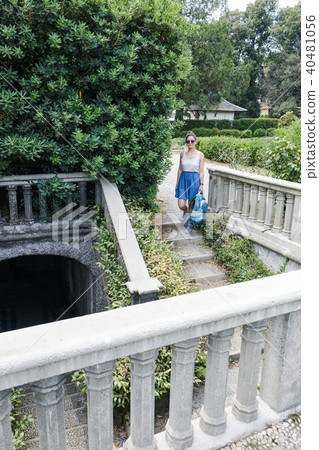 Girl walking in the park in Genoa, Italy. 40481056