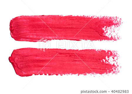 Photo of red lipstick smudges isolated on white background 40482983
