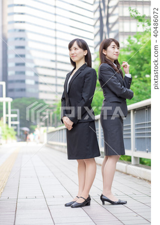 Two women in suits 40486072