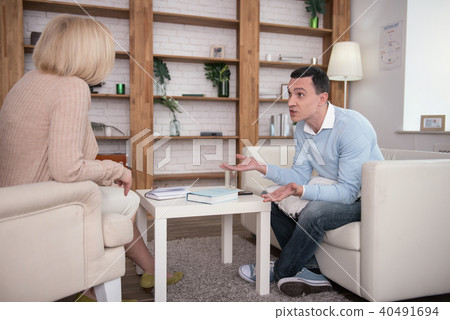 Anxious angry man lamenting about his life 40491694