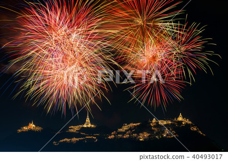 Landscape Scene of multicolor Fireworks annual festival over the Phra Nakhon Khiri (Khao Wang) which is ancient one of the landmark in Phetchaburi Province Thailand. Celebration concept Landscape Scene of multicolor Fireworks annual festival over the Phra Nakhon Khiri (Khao Wang) which is ancient one of the landmark in Phetchaburi Province Thailand. Celebration concept 40493017