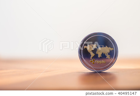 Cryptocurrency Ripple coin world map sign. Cryptocurrency Ripple coin world map sign. 40495147
