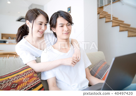 Couple watching PC Couple watching PC 40497420