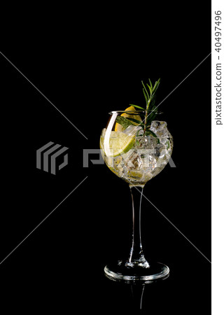 Glass of a cold cocktail drink with white wine Glass of a cold cocktail drink with white wine 40497496
