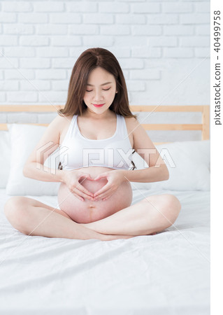 close up pregnant women belly close up pregnant women belly 40499758