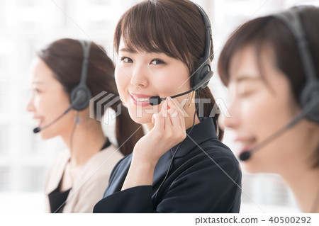 Three women at call center operator - Stock Photo [40500292] - PIXTA