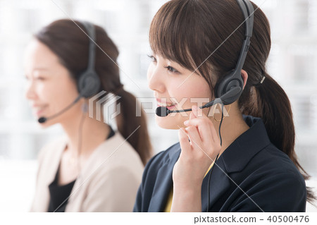 Two women at call center operator Two women at call center operator 40500476