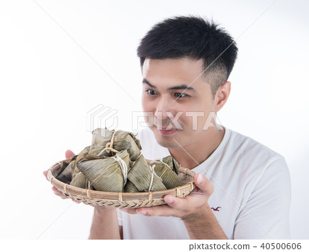 Man is looking at Zongzi Man is looking at Zongzi 40500606