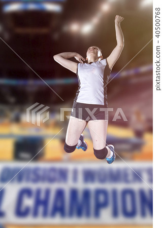 Female volleyball players jumping close-up on vollayball court. Female volleyball players jumping close-up on vollayball court. 40500768