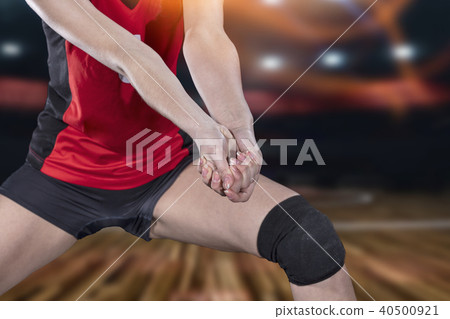 Female professional volleyball player on volleyball court Female professional volleyball player on volleyball court 40500921