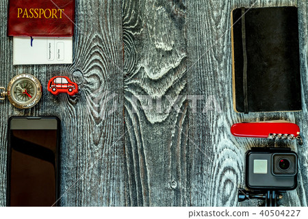 Travel accessories for trip on wooden background 40504227