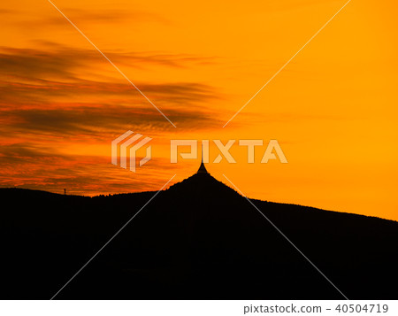 Silhouette of Jested mountain at sunset time, Liberec, Czech Republic Silhouette of Jested mountain at sunset time, Liberec, Czech Republic 40504719