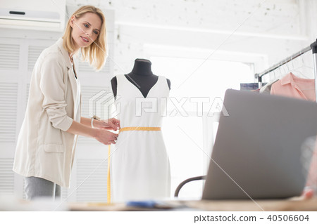 Jolly female couturier sharing tips online Jolly female couturier sharing tips online 40506604