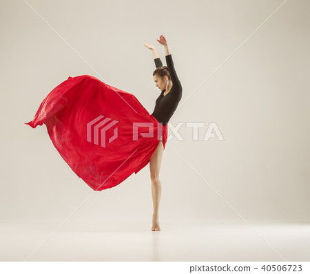 Modern ballet dancer dancing in full body on white studio background. 40506723