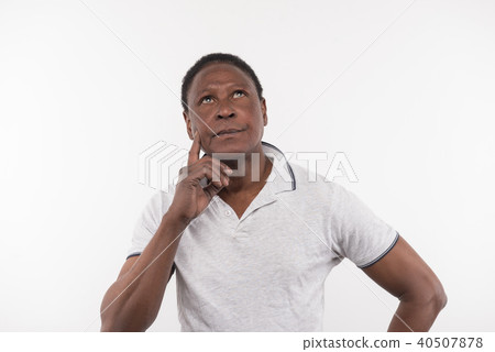 Serious thoughtful man looking up 40507878