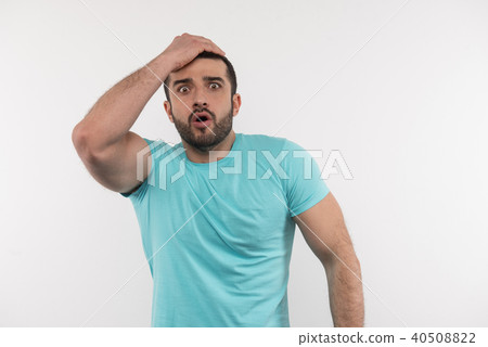 Nice surprised man touching his head 40508822