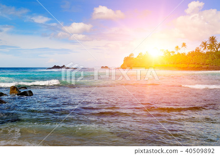 Sea landscape with rocky island and the sunrise. Sea landscape with rocky island and the sunrise. 40509892