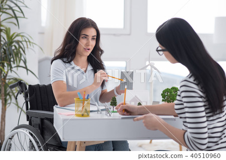 Young female engineers saving ecosystem Young female engineers saving ecosystem 40510960