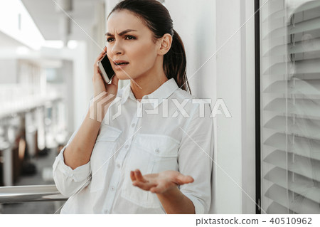 Worried woman having problems on work 40510962