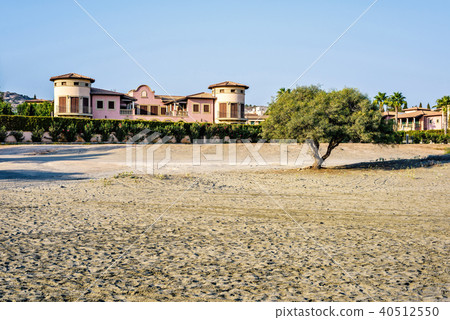 Daylight view to buildings near beach with car Daylight view to buildings near beach with car 40512550
