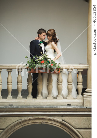 Luxury married wedding couple, bride and groom posing in old city 40512854