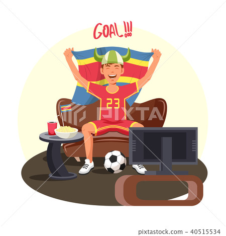 Soccer or football fan celebrating goal near TV 40515534