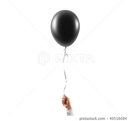 Hand hold blank black balloon mock up isolated. Balloon art. 40516084