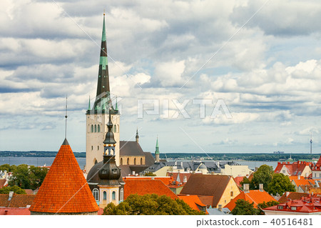 View of Tallinn Old Town, Baltic Sea and St. Olaf in cloudy summer day, Estonia View of Tallinn Old Town, Baltic Sea and St. Olaf in cloudy summer day, Estonia 40516481
