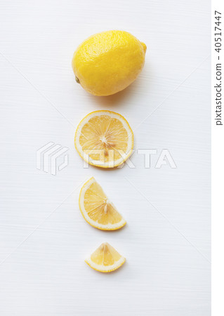 Fresh lemon with slices  on white. 40517447