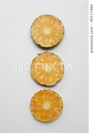 Slices of pineapple isolated on white. Slices of pineapple isolated on white. 40517460