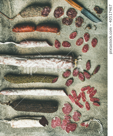 Variety of Spanish or Italian cured sausages cut in slices Variety of Spanish or Italian cured sausages cut in slices 40517467