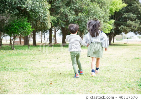 A child walking hand in hand 40517570