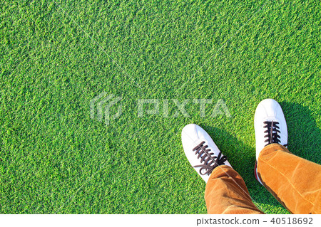 Artificial grass and feet 40518692